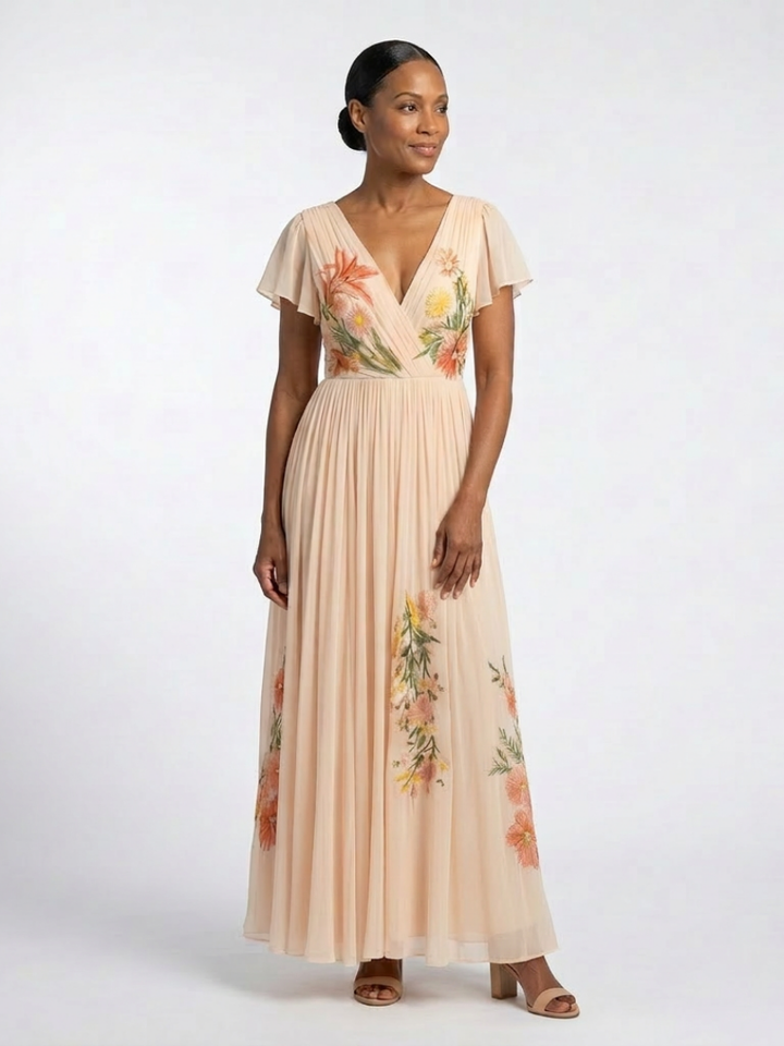 Woman wearing a floral dress on a white background