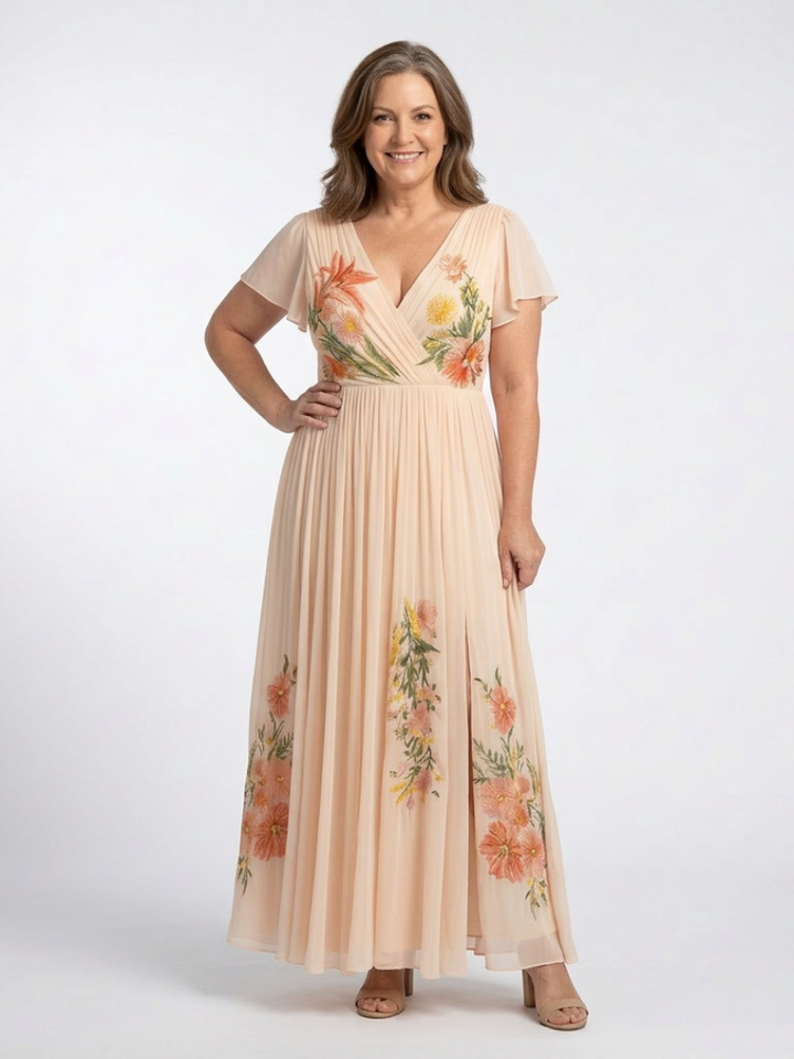 Woman wearing a beige floral dress on a white background